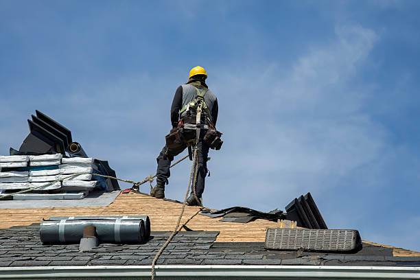 Professional Roof Replacement technician working in Belmont, NH